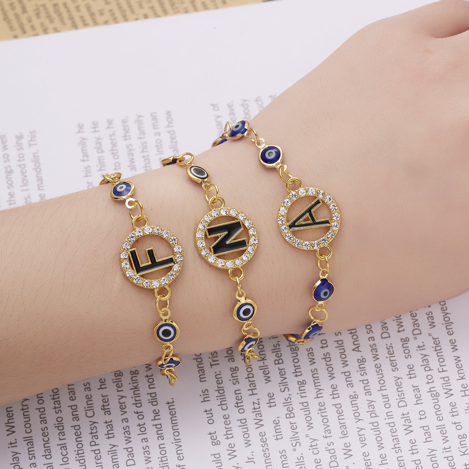 Wholesale Devil's Eye 26 Letters Rhinestone Blue Eyes Alloy Adjustable Bracelet